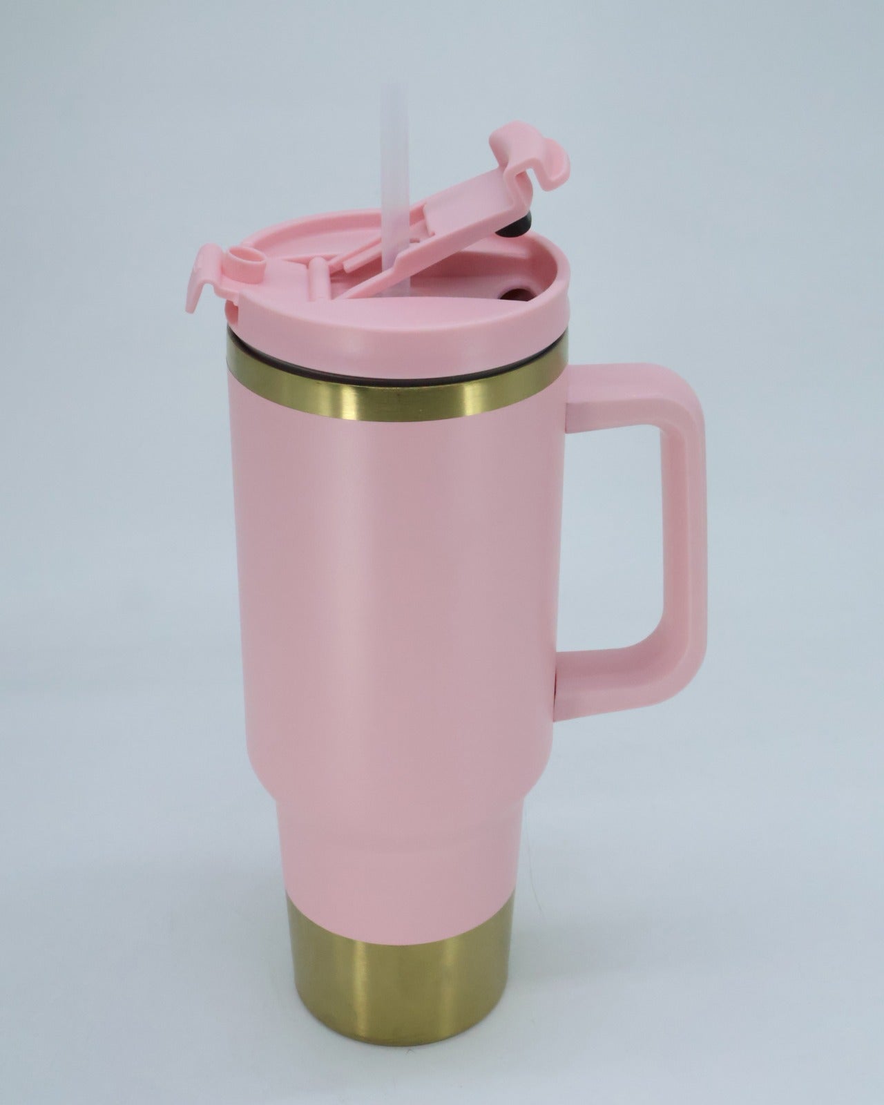 Termo tipo stanley 40 oz rosa con fondo dorado
